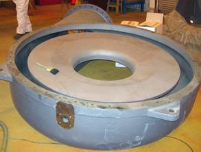 Unprotected cast iron blower housing attacked by hot acid Unprotected cast iron blower housing attacked by hot acid